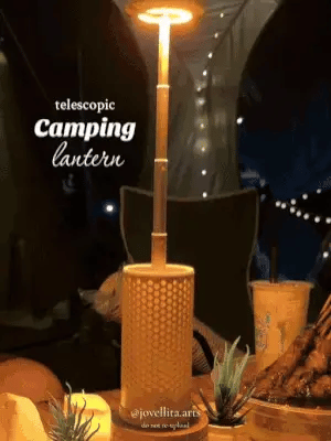 Telescopic camping light from My Store with extended adjustable LED flashlight and compact design for outdoor use.