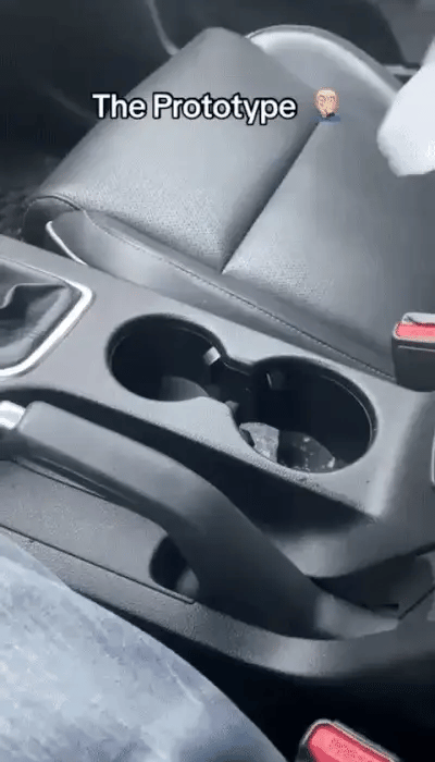 Smart Car Cup Warmer from My Store, showing a close-up of the device holding a coffee cup in a vehicle interior.